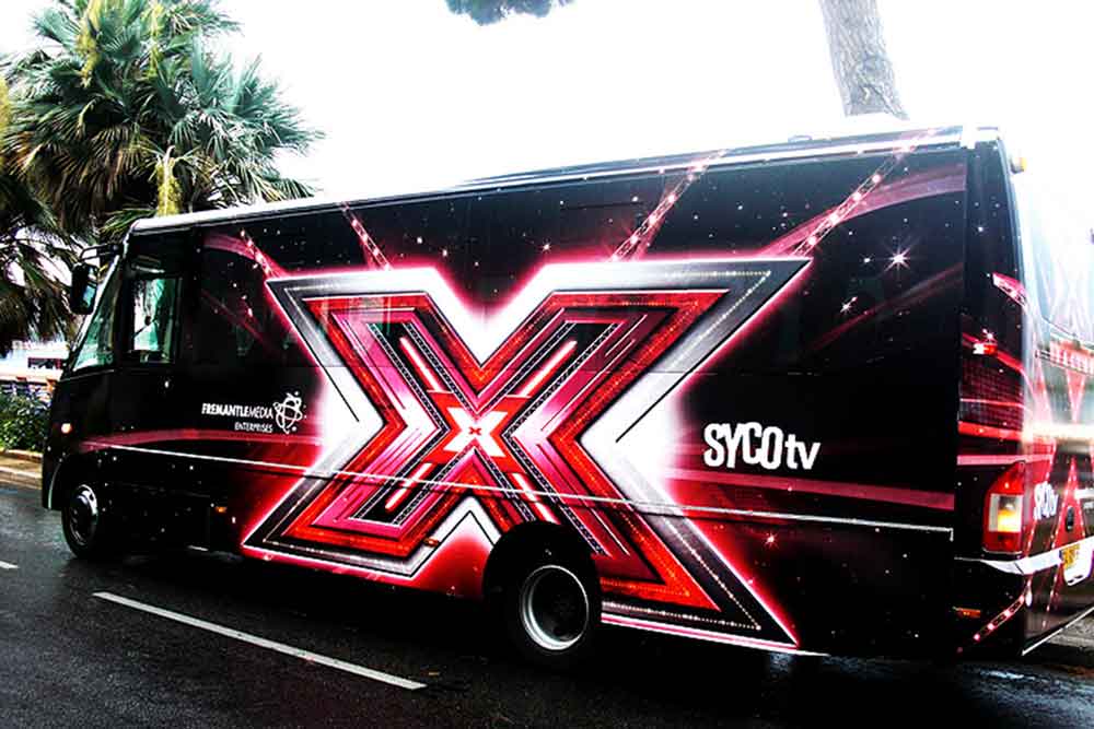 X Factor branding on minibus
