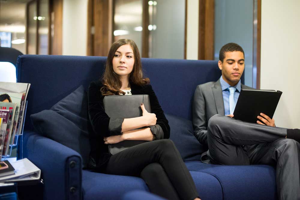 two people waiting at job interview